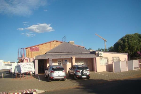 Spacious Commercial building up for sale, corner stand, offers 6 Offices, bathrooms, kitchen, open plan floor area, double carport and ...