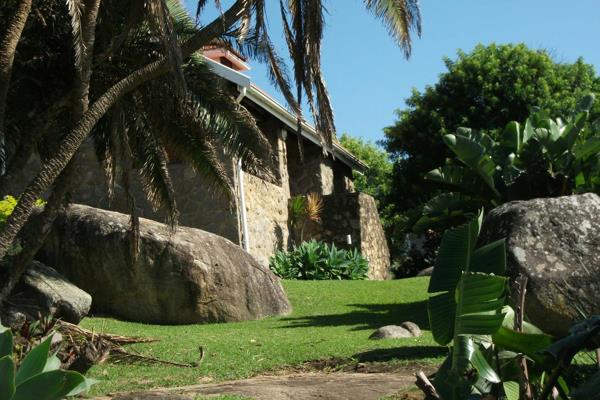 This house was built by a local doctor in 1936. He made use of the original stone found in the area to create this unique cottage ...