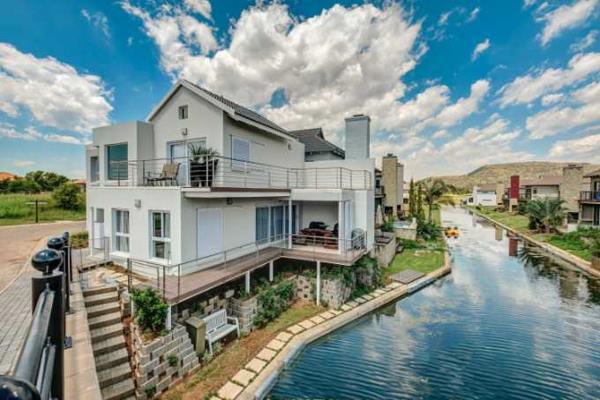 Positioned on a canal in the modern Bay Bridge Canal development this full title stand ...