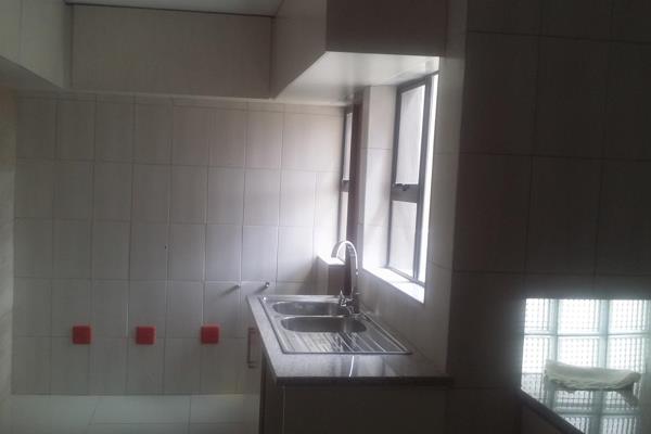 House in a security cluster.  Porcelain tiles through out. Modern Kitchen with plenty of ...