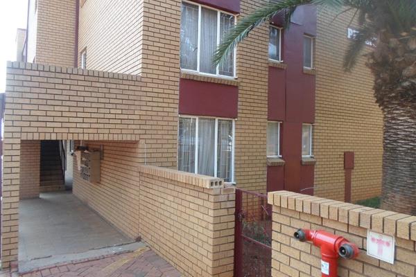 What a beautiful two bedroom for sale in Pretoria Gardens featuring two bedrooms with wardrobes, Dinning room, Kitchen with Kitchen ...