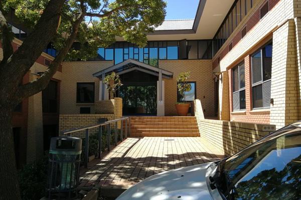 This first floor office suite of 221m2 in Constantia Office Park has great views over ...