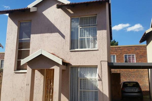 Very neat 2 bedroom unit with bathroom, guest toilet, open plan living area with new beautiful kitchen, carport. Low levies!