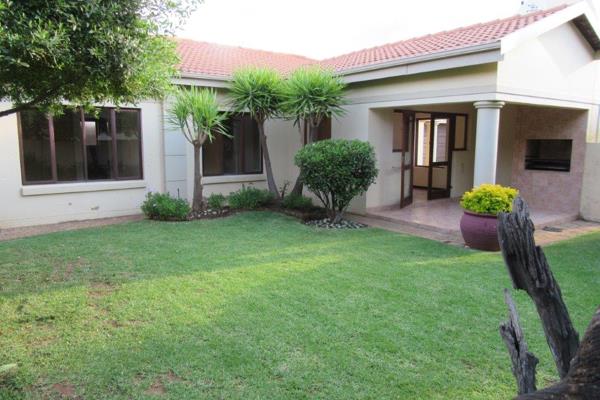 Renovated townhouse in Silver Lakes Golf Estate to let .  Open plan living areas, undercover patio with braai, renovated kitchen with ...