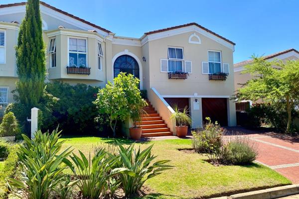 This double storey house is just down the road from Kanonberg.  Stylish ornate security ...