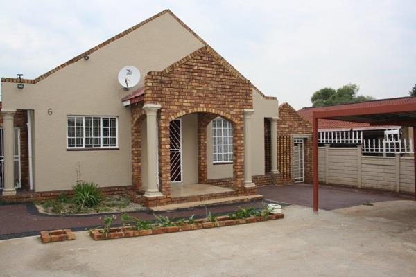 Offers 3 Bedrooms, main with Built-in Cupboards. Fully tiled home with spacious lounge ...