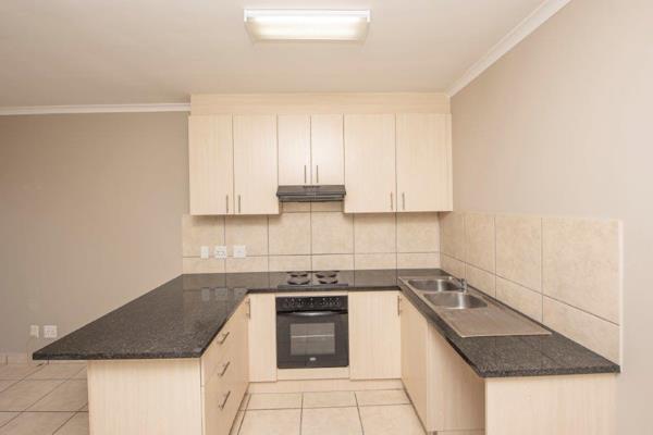 2 Bedrooms with built-in cupboards

1 Bathroom with shower only

Kitchen with ...