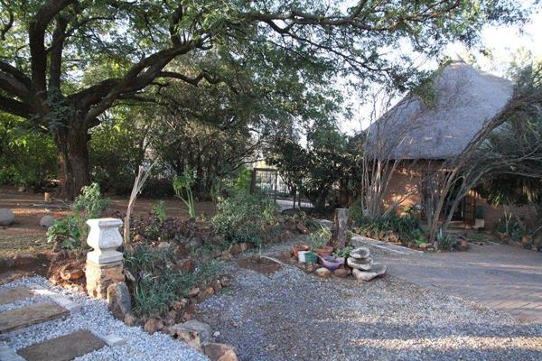 Escape loadshedding in this Double Storey Thatched Garden Cottage on a 1 hectare ...