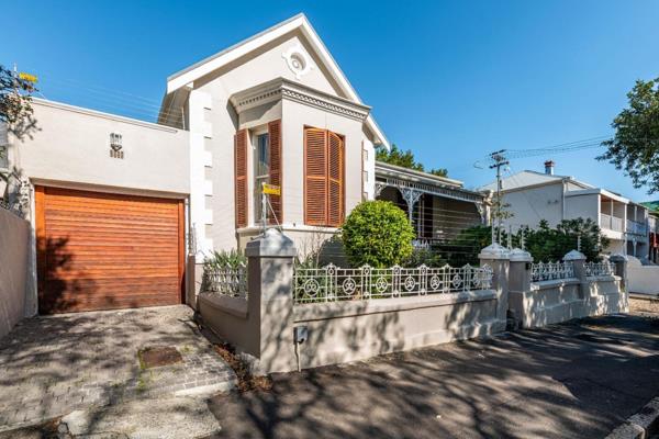 Nestled in Vredehoek, this charming four-bedroom Victorian cottage occupies a desirable ...