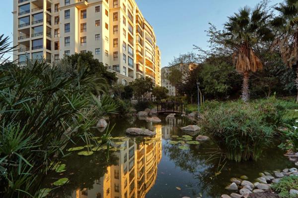 A unique East-facing groundfloor apartment in the Palm Springs building with the 24-hour ...