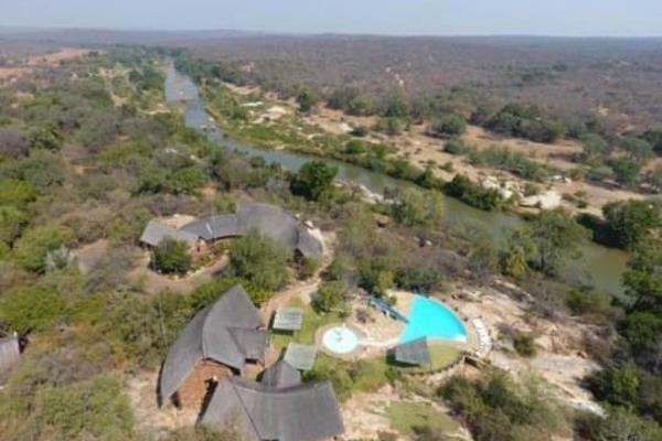 Situated on the banks of the Olifants river, with stunning elevated views of surrounding farms, and the Drakensberg escarpment in the ...