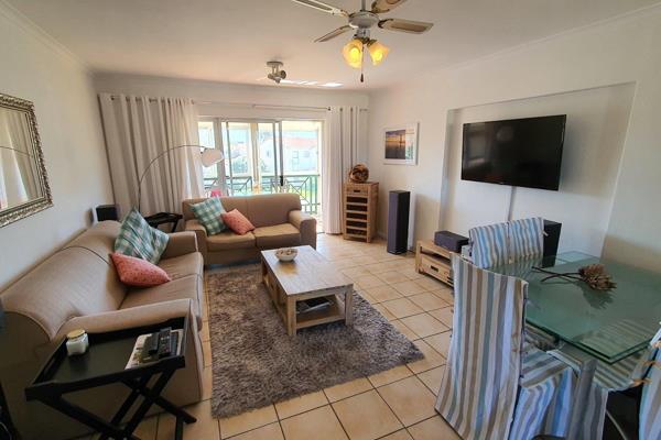 Spacious first floor apartment with loads of light &amp; views of the mountains and situated close to the beach. Open plan lounge and ...