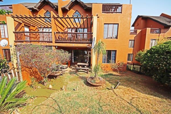 Entrance, lounge and dining area leading onto patio overlooking the large garden
Kitchen with space for appliances and breakfast ...