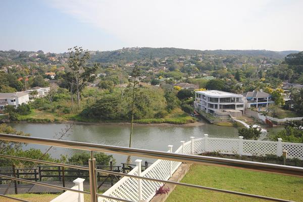 This spacious open-plan townhouse located in a small, secure complex overlooking the Nahoon River is a must to view.  The living area ...