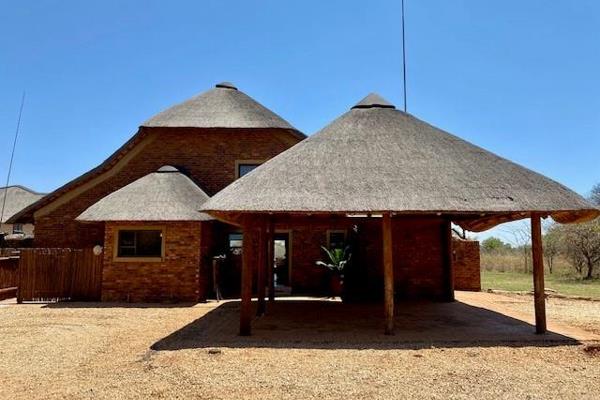 Rugged rocky finishes meet African style in this one of a kind property, not only is this property easy on the eyes but also easy on ...