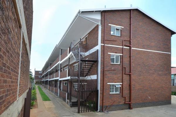 This spacious second-floor flat in Linden, Johannesburg, is ideally located within ...