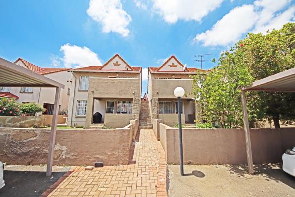 Entrance hall, lounge and dining room
Kitchen with breakfast nook
2 bedrooms and a bathroom
Balcony off lounge.
Carport

Pool ...