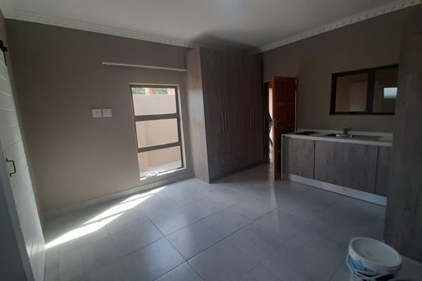 Bachelor apartment with a small kitchen and a bathroom with a shower, basin and toilet

Pre paid electricity.
No pets ...