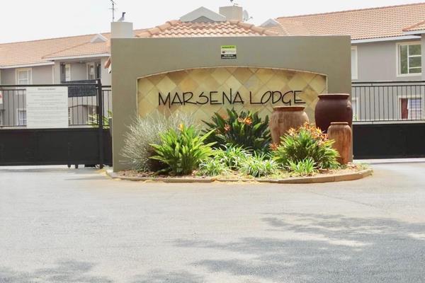 Modern open concept 1 bedroom ground floor in a secure complex. Open kitchen with ...