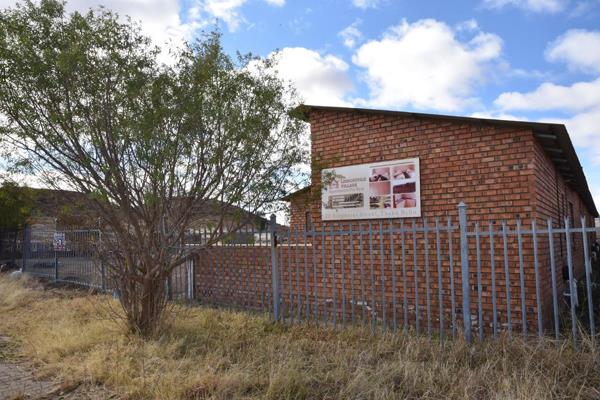 Located in the small, friendly town of Thaba Nchu with gorgeous views of mountains, is this spacious two bedroom apartment with a ...