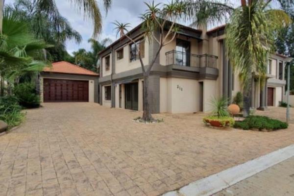 This beautiful spacious modern house in a security complex boasts uninterrupted views of ...