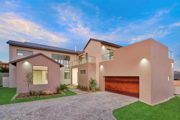 This modern home offers 4 spacious bedrooms, 3 of which are upstairs and one downstairs. ...