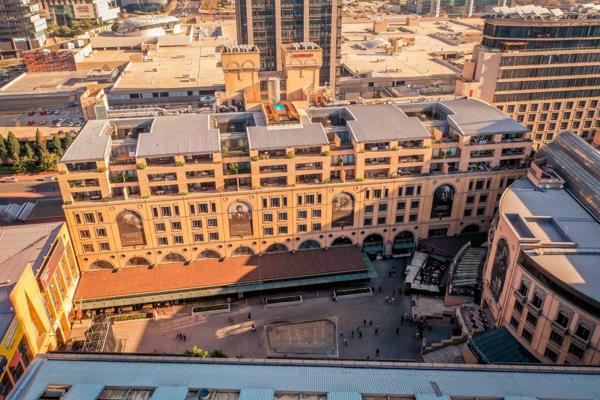 Over looking the Nelson Mandela Square in the heart of Sandton, quietly nestles the ...