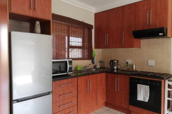 Separate one bedroom with built-in cupboards and bathroom with shower, basin, BIC and toilet.
Open plan living area and kitchen with ...