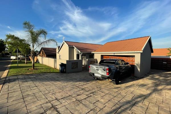 This lovely family home offers 3 bedrooms, 2 bathrooms and a double garage. 
Private garden with built-in braai.