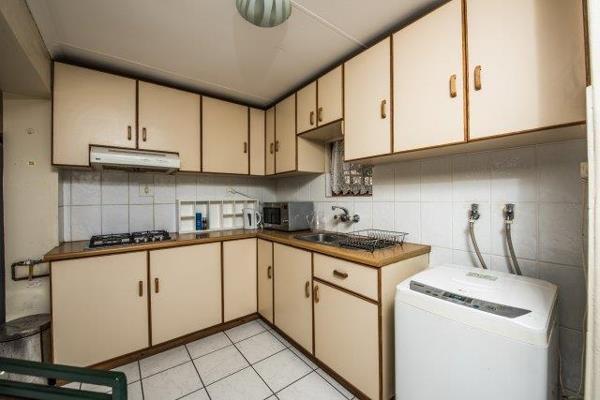 The apartment is located on a property alongside another residence with separate ...