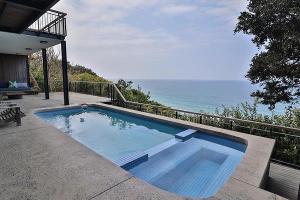 Live the coastal dream in this stunning, modern home with jaw-dropping sea views in ...