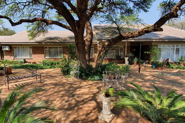 &quot;Old world elegance&quot; is just one of many ways to describe this property. This colossal house was built in times when space ...