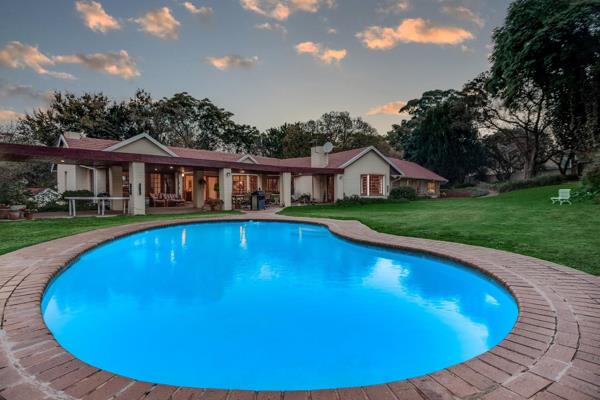 North-facing large family home. The entrance leads to the front door courtyard with a water feature. Light and sunny receptions flow ...