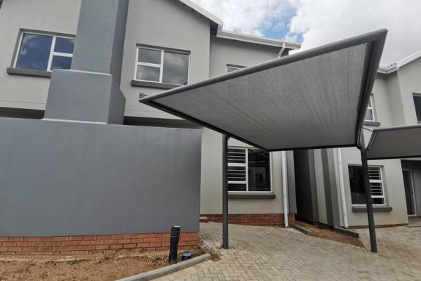 Modern Two bedroom, 2 bathroom townhouse, with an open plan kitchen/lounge/dining area. Built in braai and a carport. 

Prepaid ...