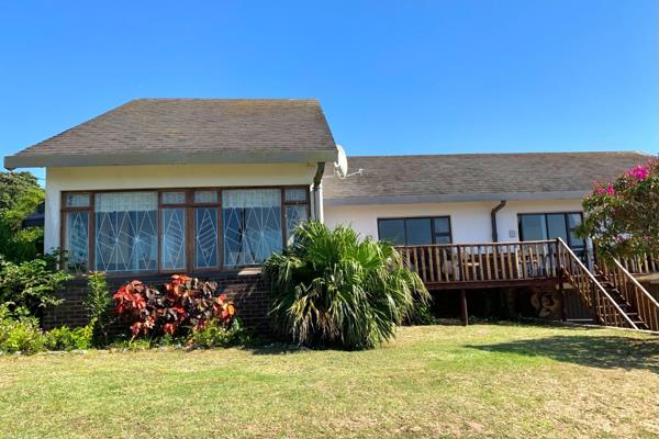 This four bedroom home - or three bedroom with study - has a spacious dining area and lounge with sea views. An enclosed sun room. ...