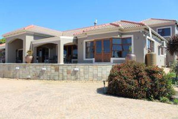 DUAL MANDATE
This home is designed for luxury and style with ocean, mountain and valley ...