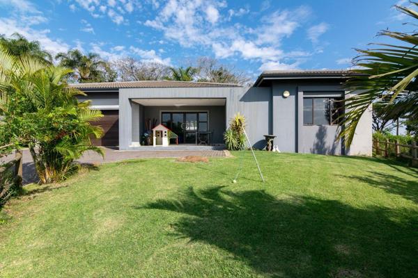 The exceptionally spacious open plan living space of this modern residence is ...