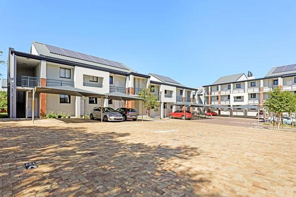 Discover modern living in this spacious ground-floor apartment, located within a 24-hour manned security estate featuring expansive ...