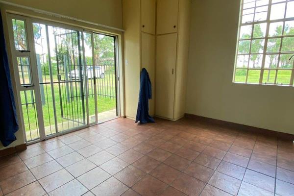 Bachelors flat with a separate bathroom. 
Single carport.