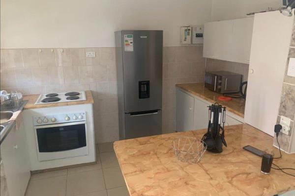 This flat is a must see. Walking distance to schools, Manny&#39;s and the gym. 

It offers a neat kitchen with build in cupboards and ...