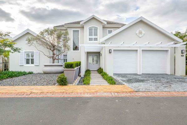 This home is located in the Vines neighbourhood on Val de Vie Estate, overlooking a ...