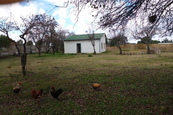 This neat cottage is offering, Two well sizes Bedrooms with Built-in Cupboards &amp; tiled flooring.
 One Bathroom consisting of a ...