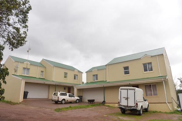 These identical two townhouses are located on one plot and are marketed as a unit.

The ...