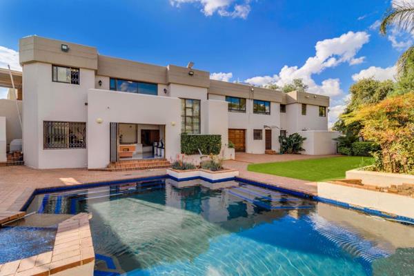 This beautiful, light, and bright contemporary home invites you to view. The eat-in kitchen, centered around the main living areas ...