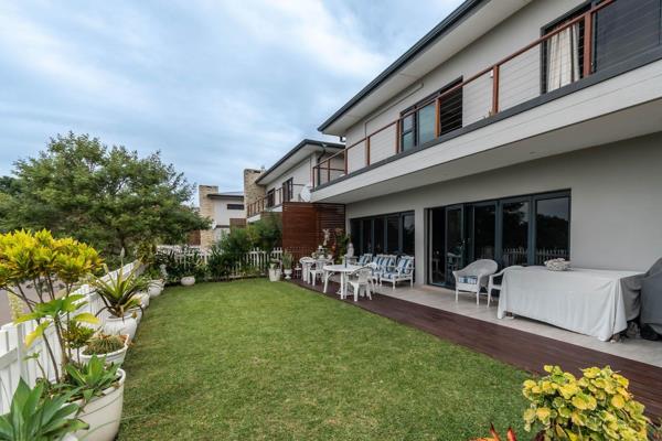 Modern three bedroom home with coastal forest and distant sea views in Emperors Ridge ...