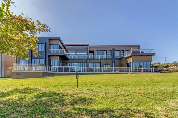 Come home to enjoy the expansive views over the golf course and fairway from this imposing designer home set on a large stand. 

With ...