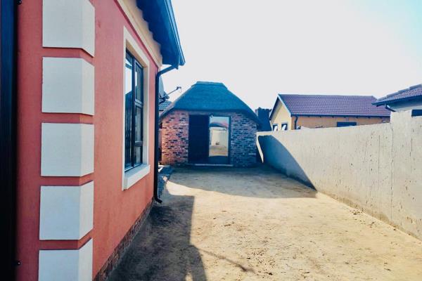 This property  consist of 3 bedrooms,  2 bathrooms,  open plan kitchen  with a lapa , very neat property must look.