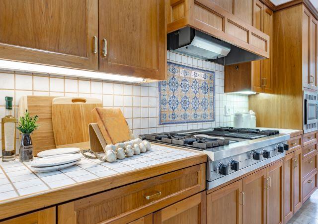 A quick, easy, and inexpensive solution for dated kitchen countertops ...