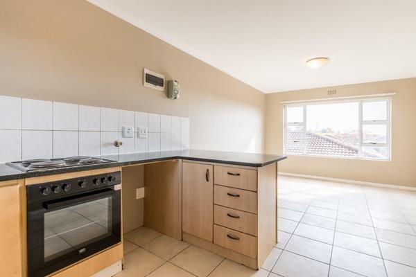 Lovely apartment that offers two tiled bedrooms, a full bathroom consisting of a bath, shower, basin and toilet as well as an open plan ...