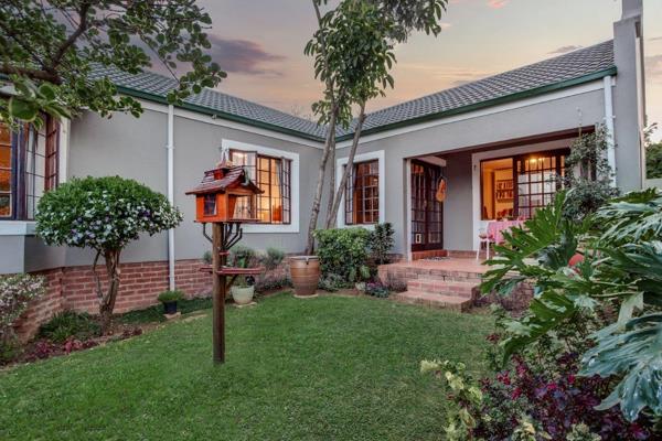 Instantly captivating is this gorgeous cluster-style home with wooden &amp; bay windows. Featuring entrance onto spacious formal ...